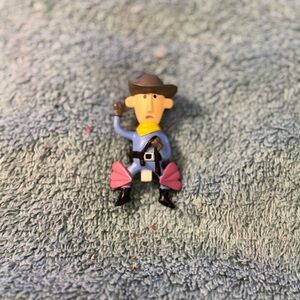Cowboy Action Figure with Pink and Blue Outfit
